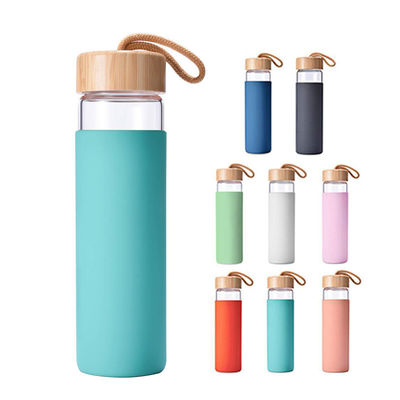 Custom 18oz Glass Water Bottles Reusable Glass Juice Bottles For Coffee Tea Water Juices With Lids